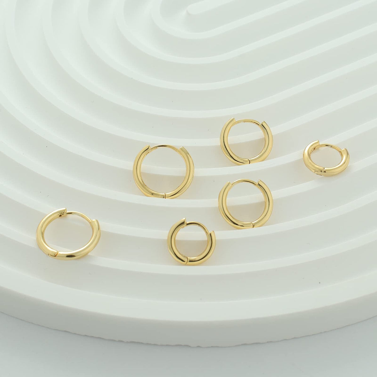 Set de 4 Pares de Aros Huggie Chapados en Oro